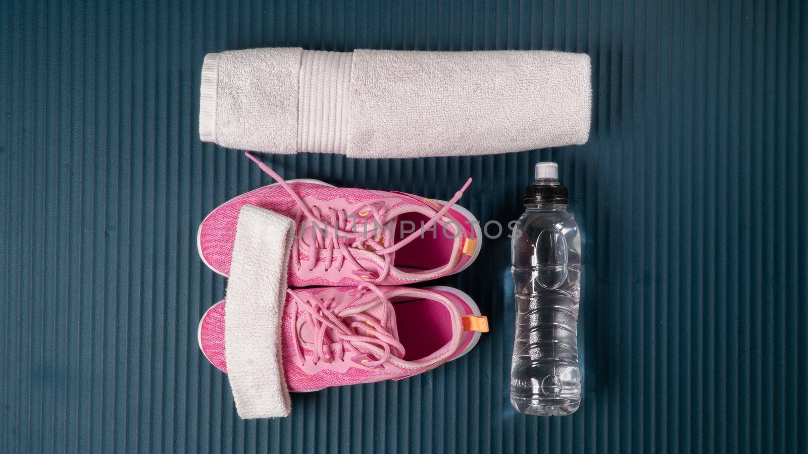 Gym workout kit - sneakers, towel, water by voktybre