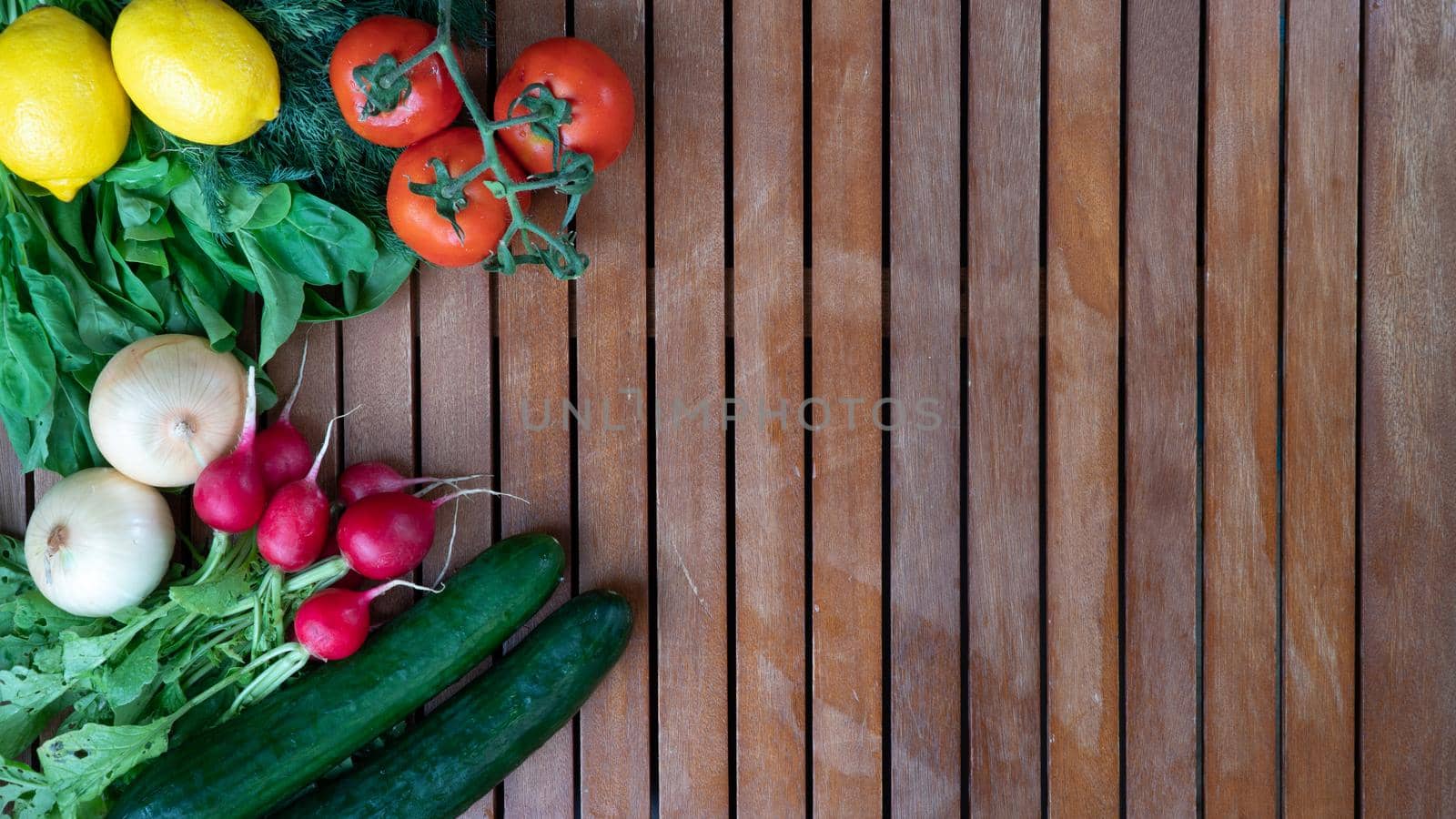 set of vegetables and greens on the side flat background on the tree. High quality photo