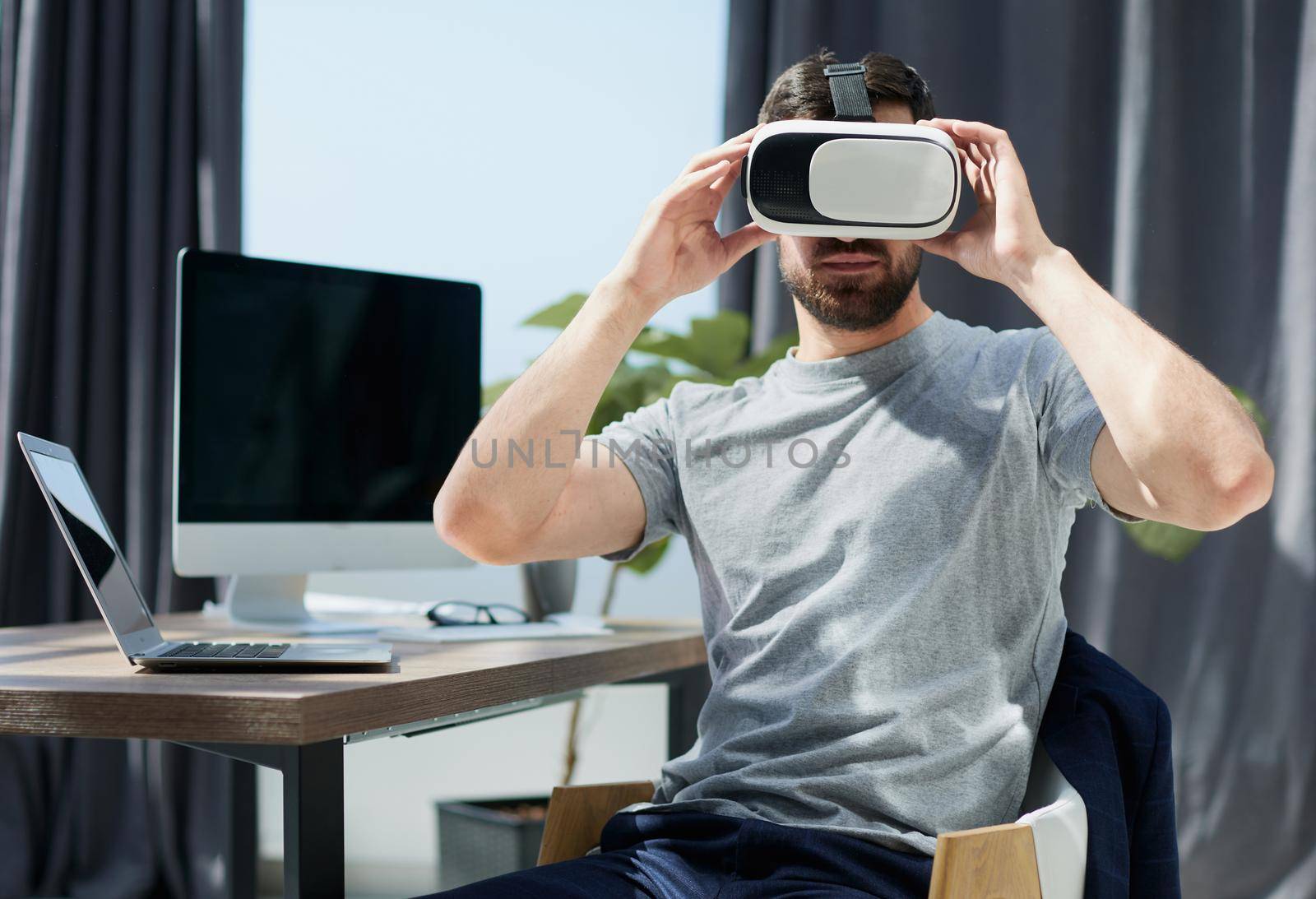 businessman in virtual reality glasses or headset