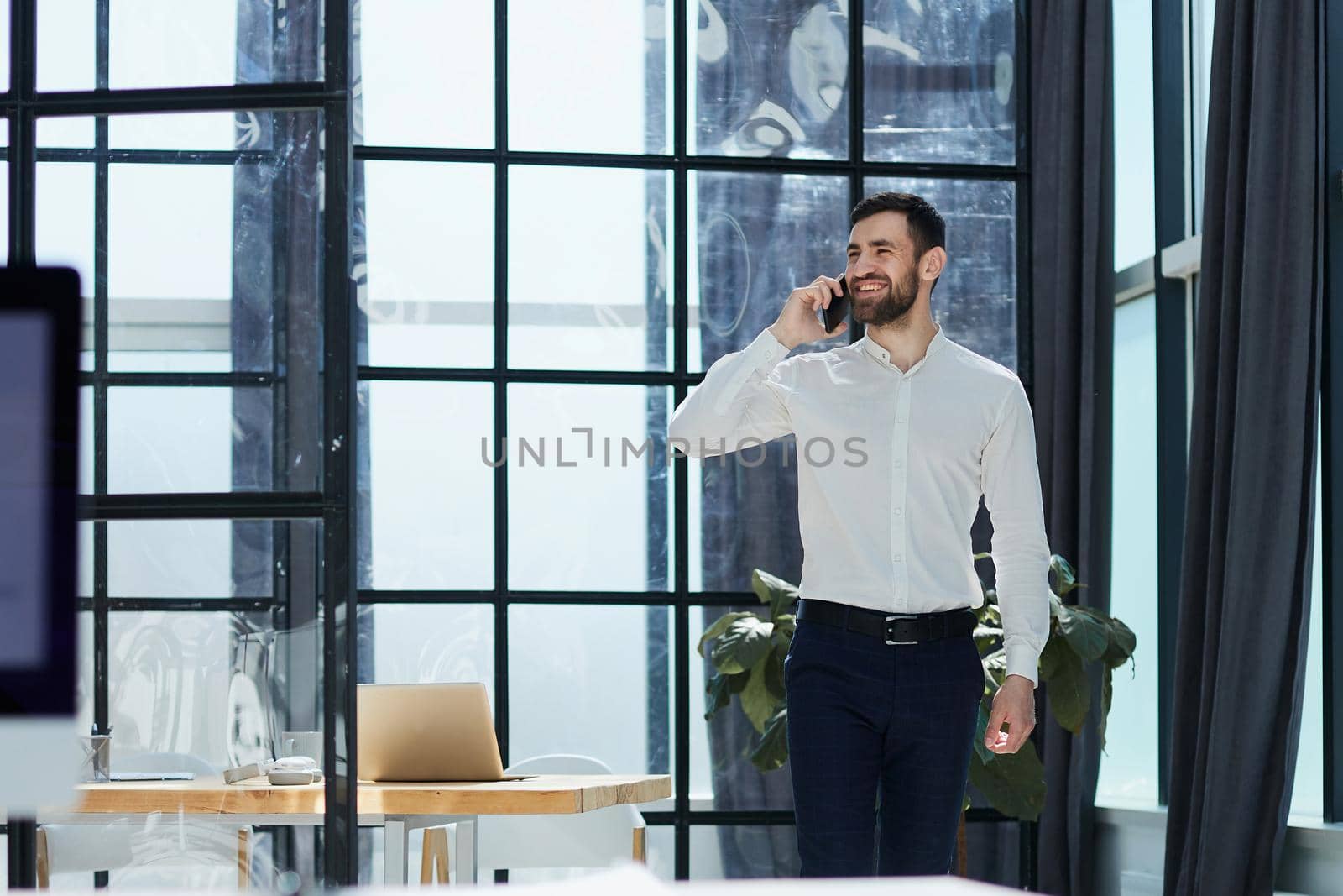 Customer care worker in an office on the telephone