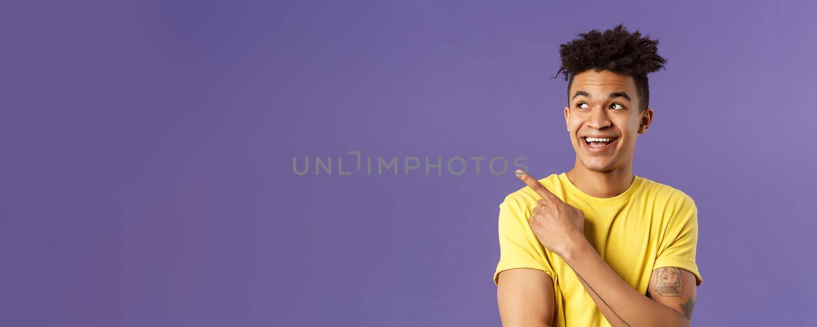 Close-up portrait of funny cute hispanic man with dreads, laughing and smiling at something, pointing looking upper left corner enthusiastic expression, purple background by Benzoix
