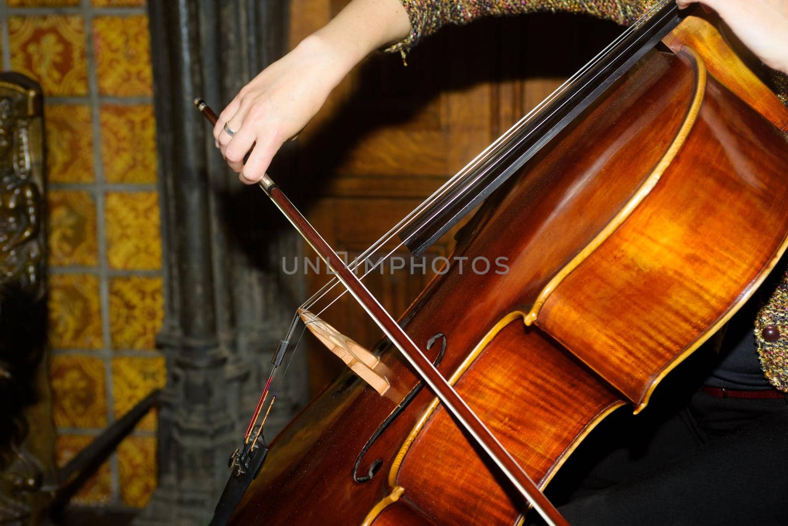 Hand playing cello by Youri