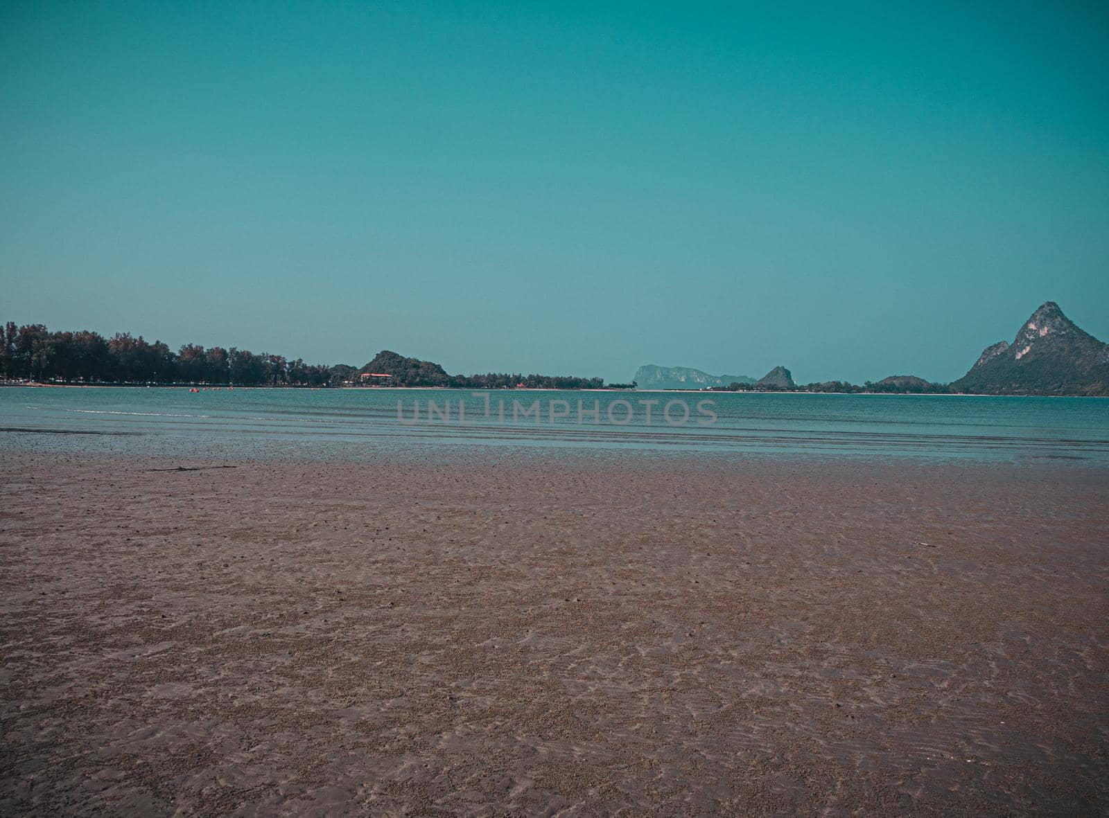 horizon scenics sand beach Calm sea blue water ocean blue sky nature landscape background.