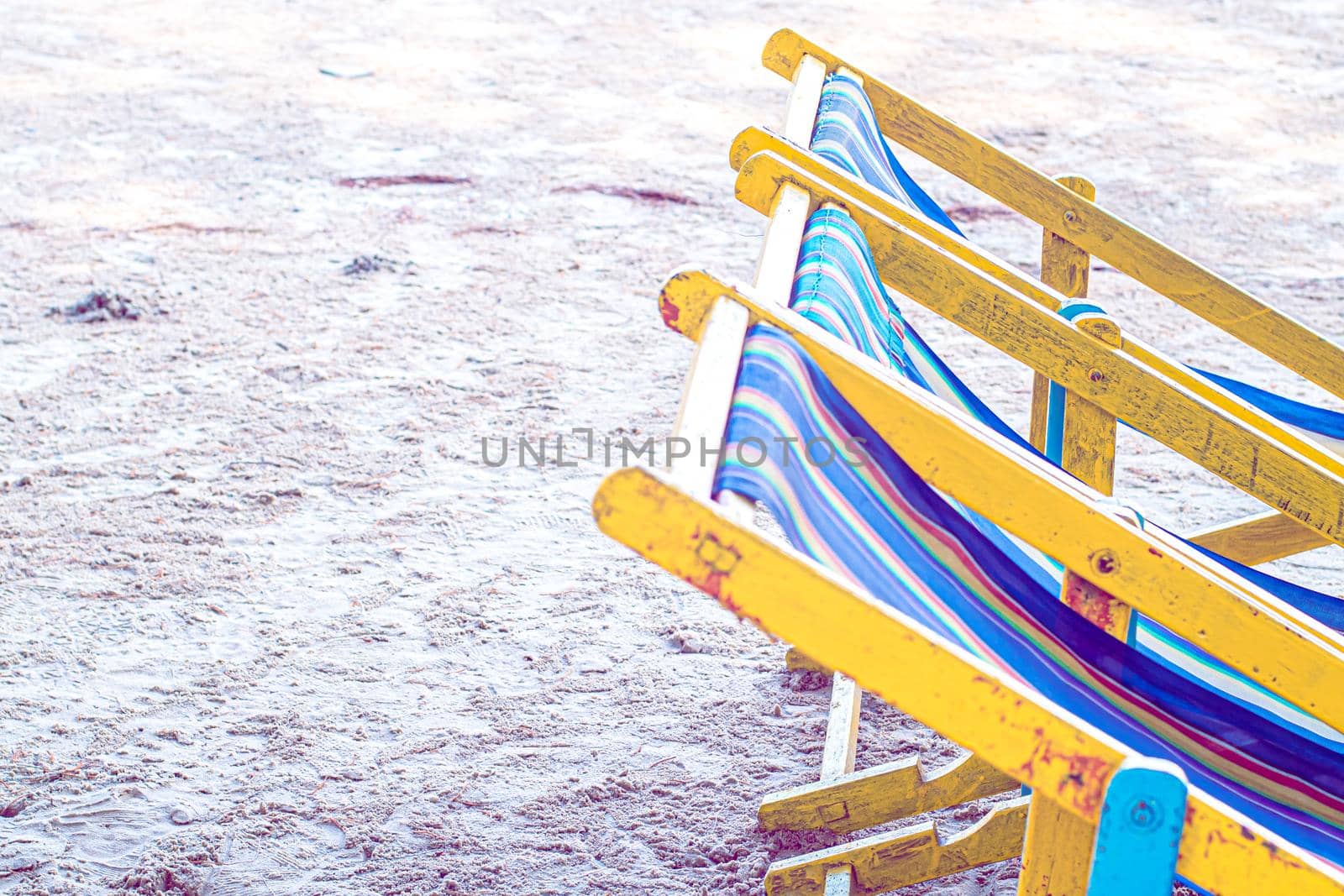 colorful Beach Chairs on the Coast sand beach in summer time travel vacation relax.