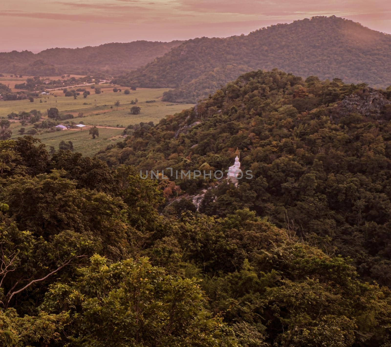 panorama mountain forest landscape  with white buddha statue on mountain