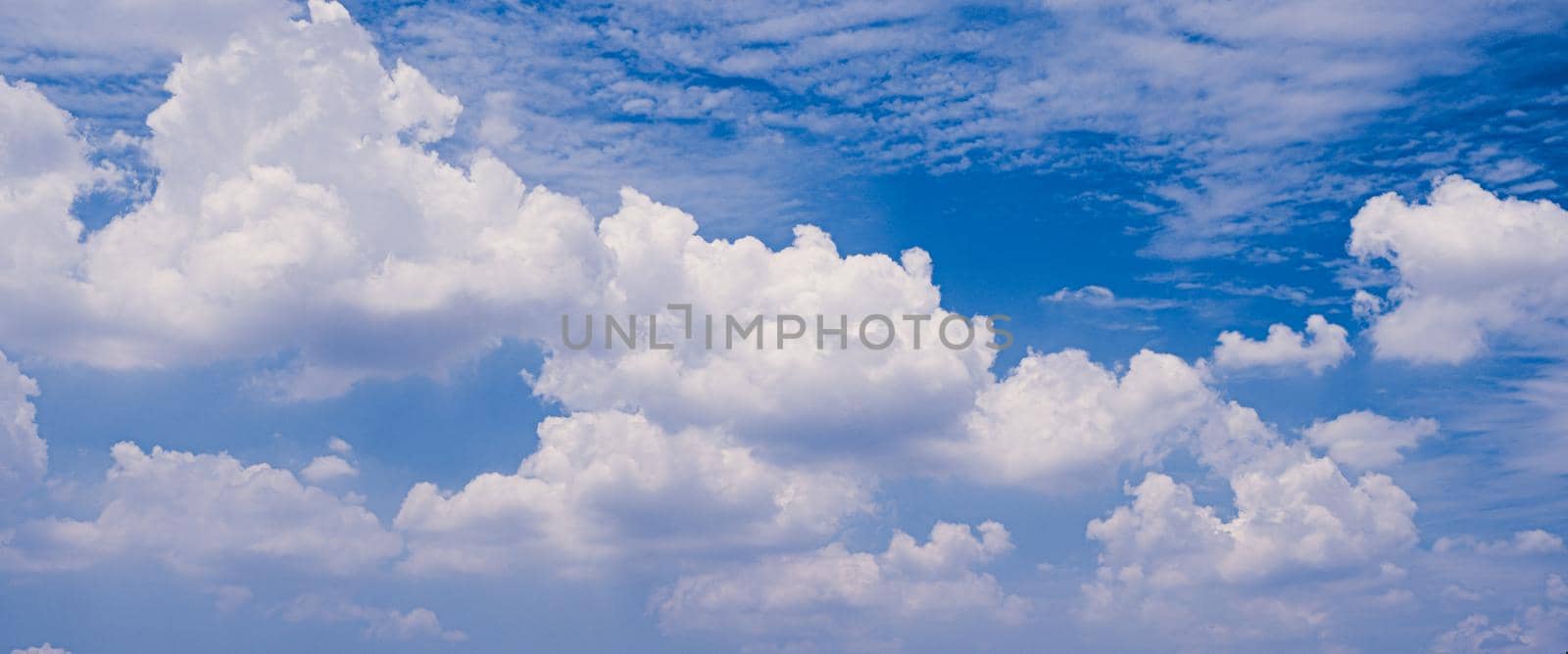 white fluffys clouds with blue sky nature background abstract weather season. by Petrichor