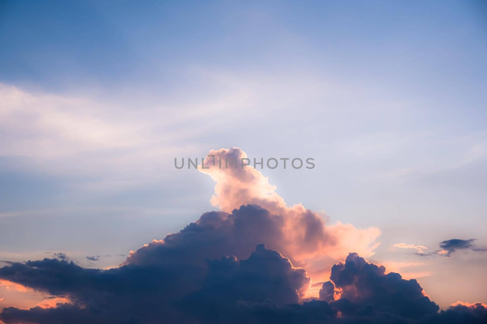 Clouds twilight sky in pastel color Pink and blue, colorful spiritual background.