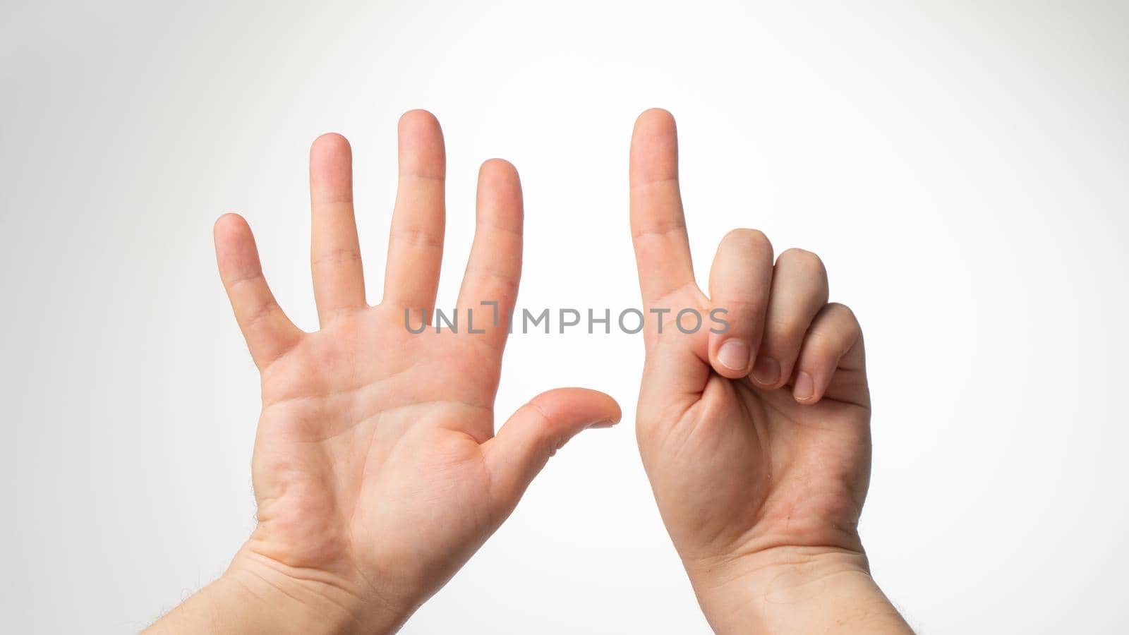 Men's hands gesture counting on fingers 6 palmar side. High quality photo