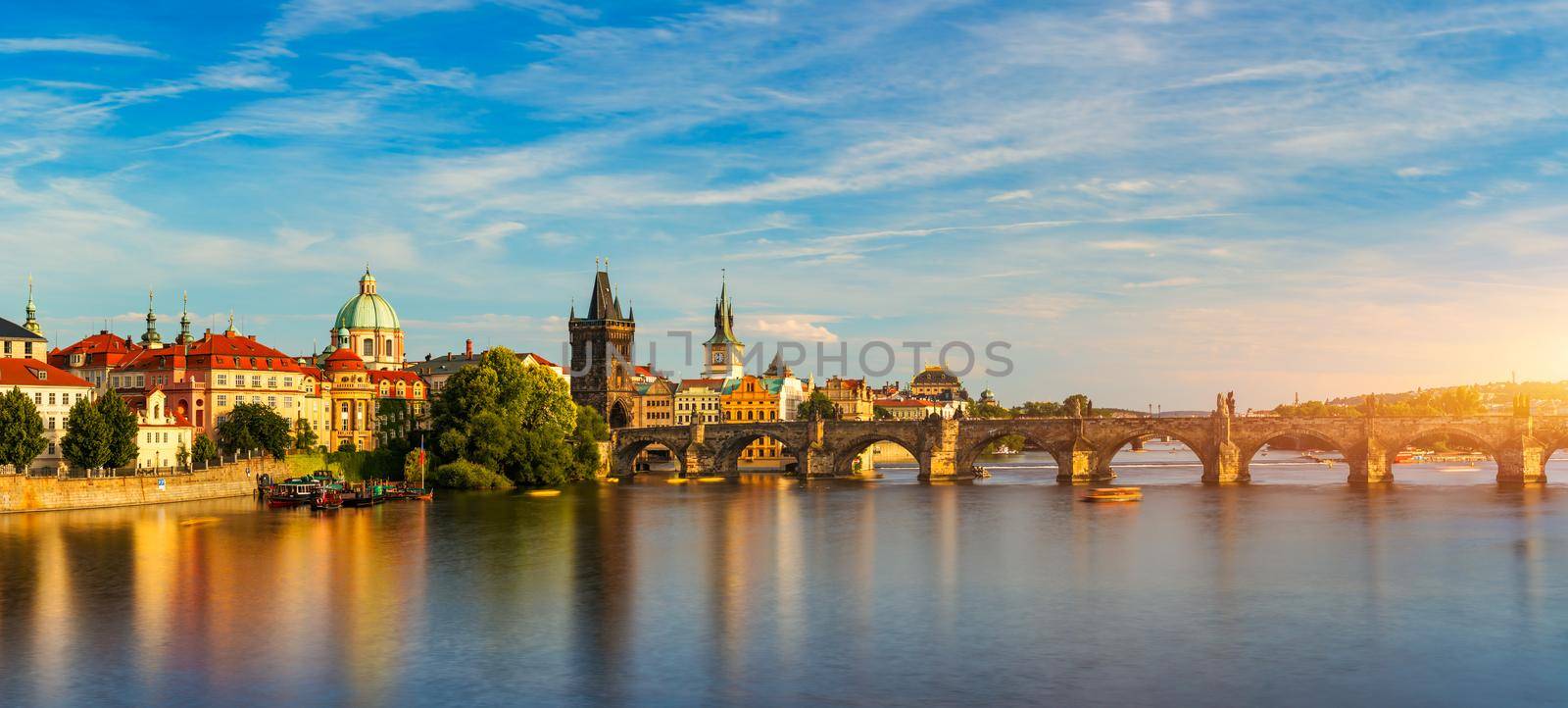 Charles Bridge sunset view of the Old Town pier architecture, Charles Bridge over Vltava river in Prague, Czechia. Old Town of Prague with Charles Bridge, Prague, Czech Republic.