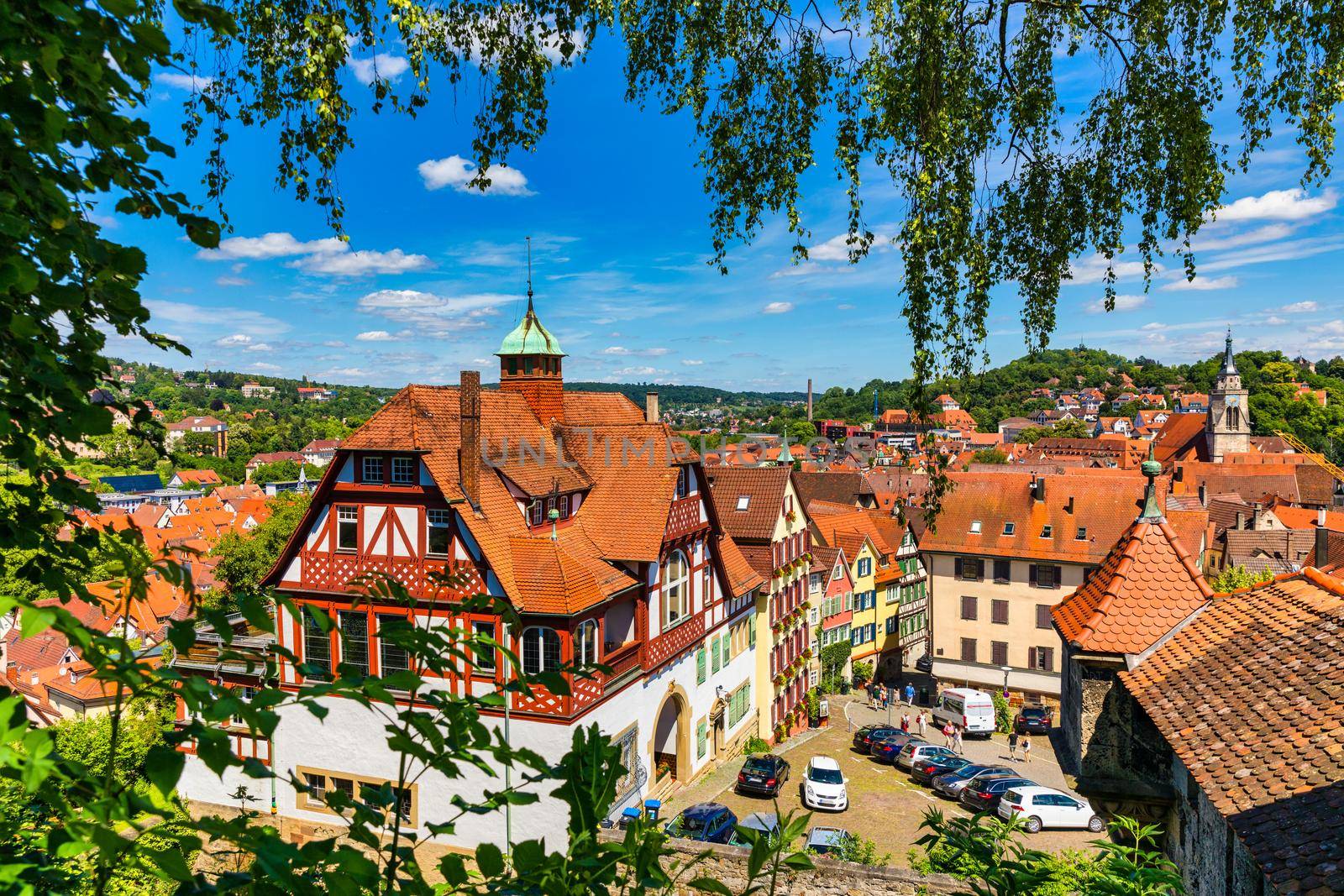 Beautiful floral colorful town Tubingen in Germany (Baden-Wurttemberg). Houses at river Neckar and Hoelderlin tower, Tuebingen, Baden-Wuerttemberg, Germany. Tubingen, Germany. 