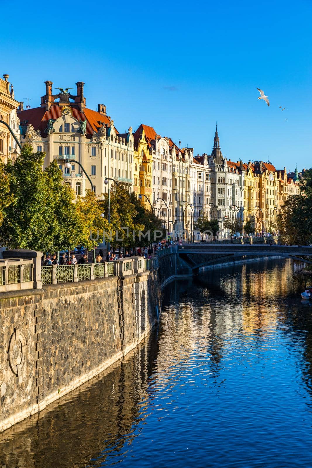 Old Town of Prague in Czechia. Prague, Czech Republic. Vltava River and old buildings across the river. Concept of world travel, sightseeing and tourism.