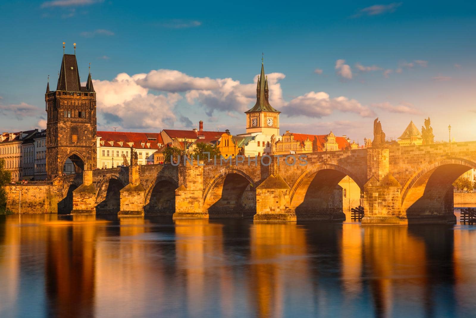 Old town of Prague. Czech Republic over river Vltava with Charles Bridge on skyline. Prague panorama landscape view with red roofs.  Prague view from Petrin Hill, Prague, Czechia.