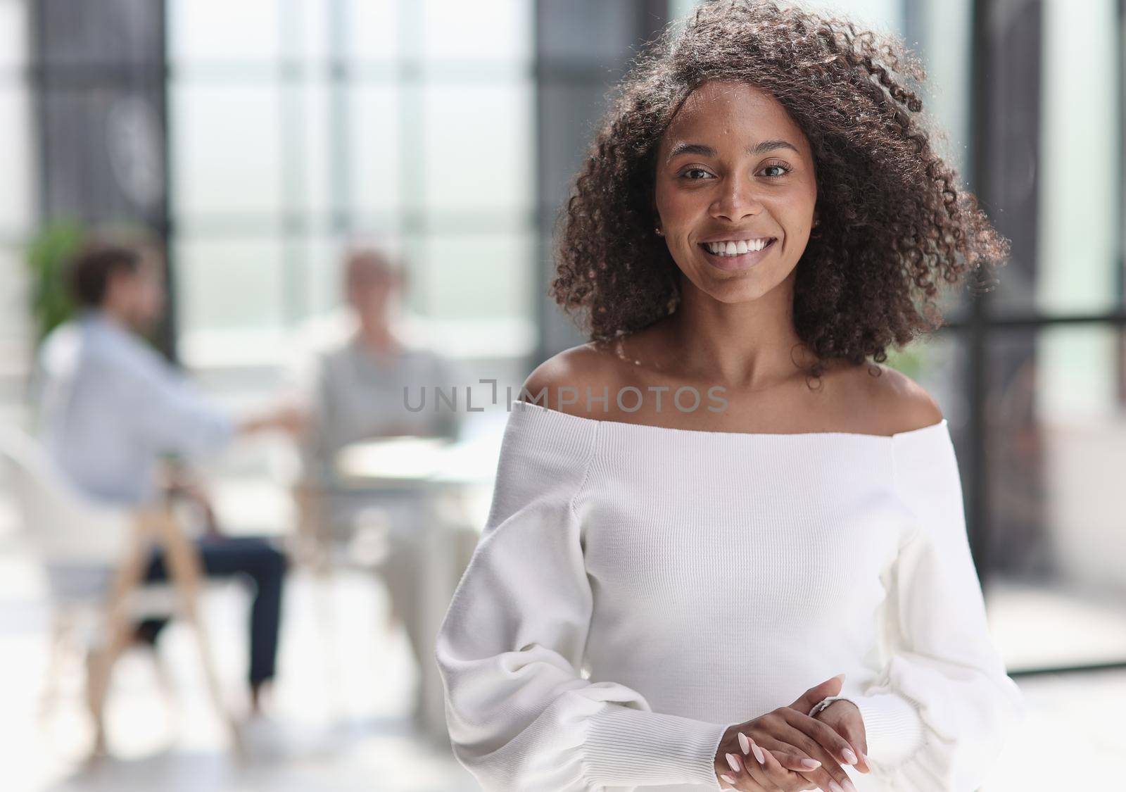 Portrait of an African American young business woman working in the office