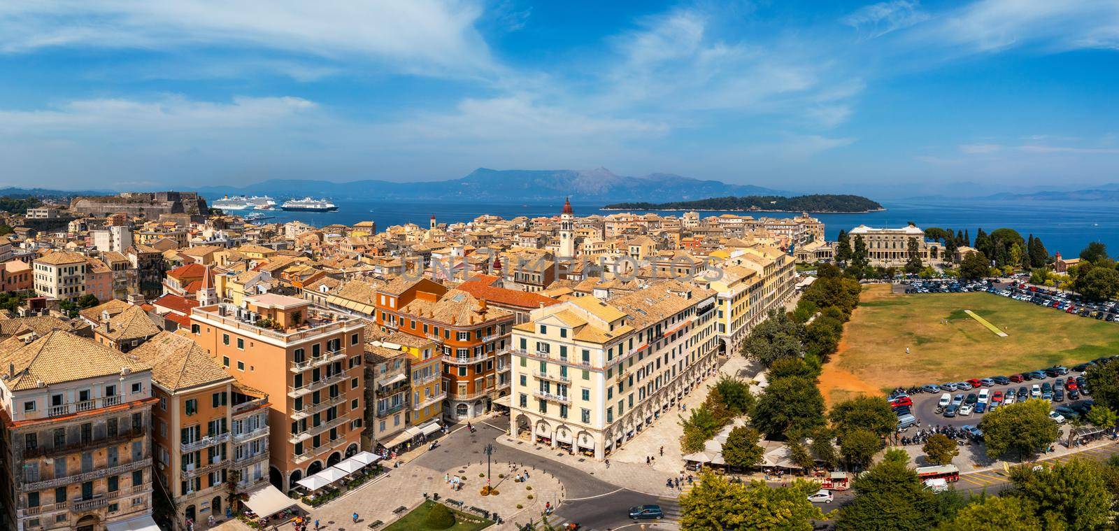 Panoramic view of Kerkyra, capital of Corfu island, Greece. Aerial drone view of Kerkyra with beautiful buildings during summer sunny day. Corfu island, Greece. 