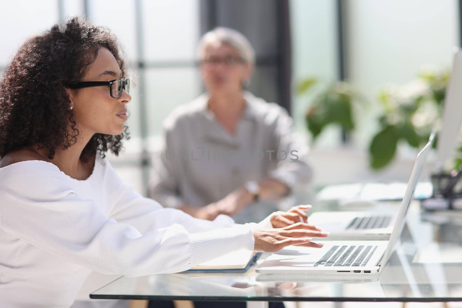 young attractive african american woman in the office