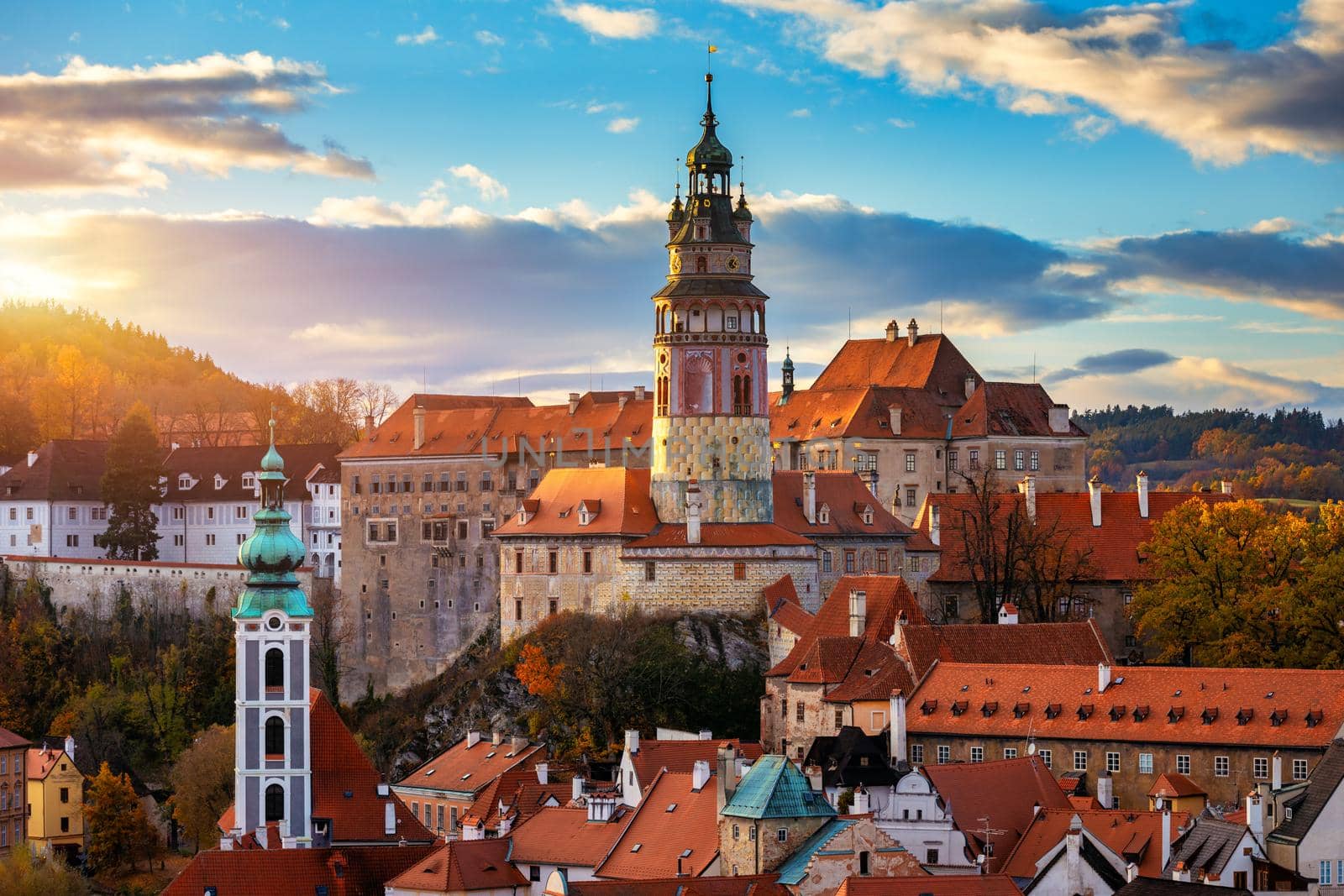 View of historical centre of Cesky Krumlov town on Vltava riverbank on autumn day overlooking medieval Castle, Czech Republic. View of old town of Cesky Krumlov, South Bohemia, Czech Republic.