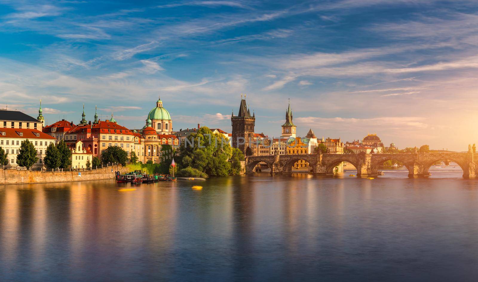 Charles Bridge sunset view of the Old Town pier architecture, Charles Bridge over Vltava river in Prague, Czechia. Old Town of Prague with Charles Bridge, Prague, Czech Republic.