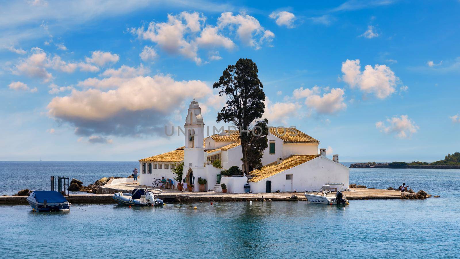 Beautiful landscape with Holy Monastery of Panagia Vlacherna of the coast Ionian Sea in the Corfu or Kerkyra is a Greek island, Europe. Monastery of Panagia Vlacherna in Corfu island, Ionian, Greece