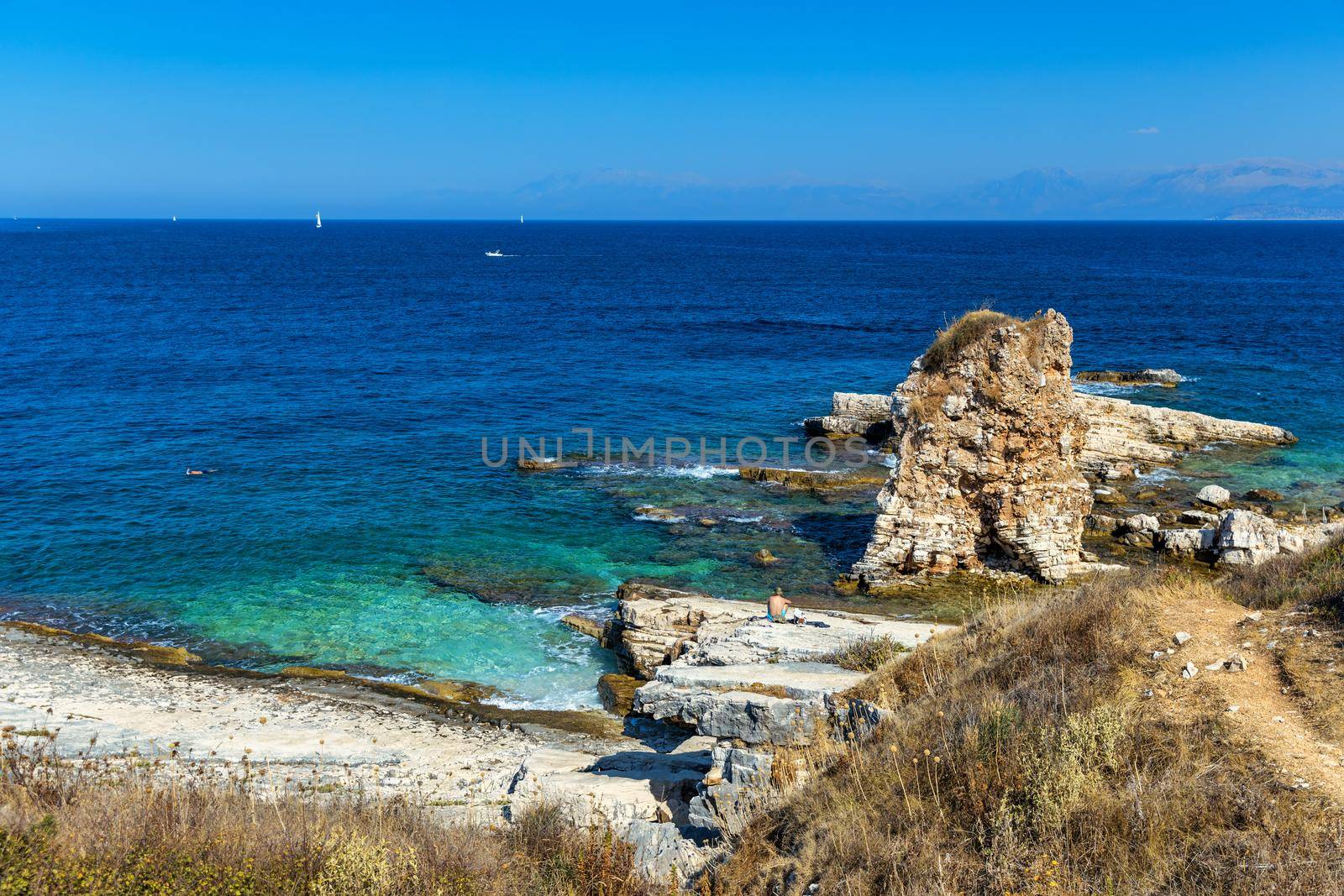 View north east coast with Kanoni and Mpataria beach, Island of Corfu, Greece. Mpataria and Kanoni beach at Corfu Greece during the day. 
