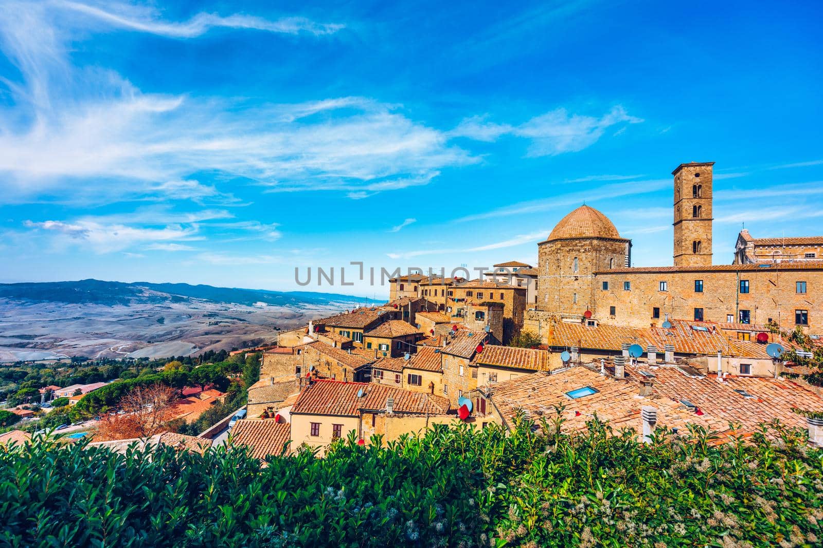 Tuscany, Volterra town skyline, church and panorama view. Maremma, Italy, Europe. Panoramic view of Volterra, medieval Tuscan town with old houses, towers and churches, Volterra, Tuscany, Italy.