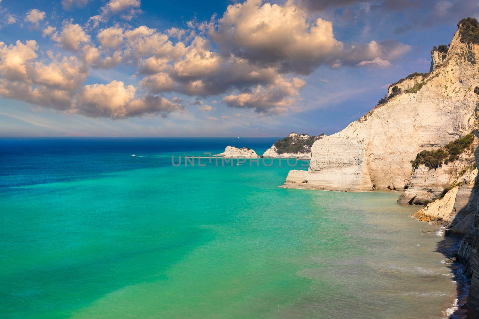 Beautiful view of Cape Drastis in the island of Corfu in Greece. Cape Drastis, the impressive formations of the ground, rocks and the blue waters panorama, Cape Drastis, Corfu, Greece, Ionian Islands.