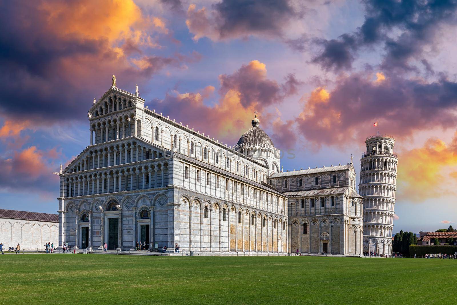 Pisa Cathedral and the Leaning Tower in a sunny day in Pisa, Italy. Pisa Cathedral with Leaning Tower of Pisa on Piazza dei Miracoli in Pisa, Tuscany, Italy.