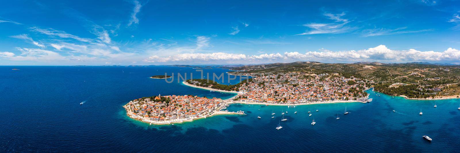 Aerial view of Primosten old town on the islet, Dalmatia, Croatia. Primosten, Sibenik Knin County, Croatia. Resort town on the Adriatic coast. Aerial view of adriatic town Primosten, Croatia