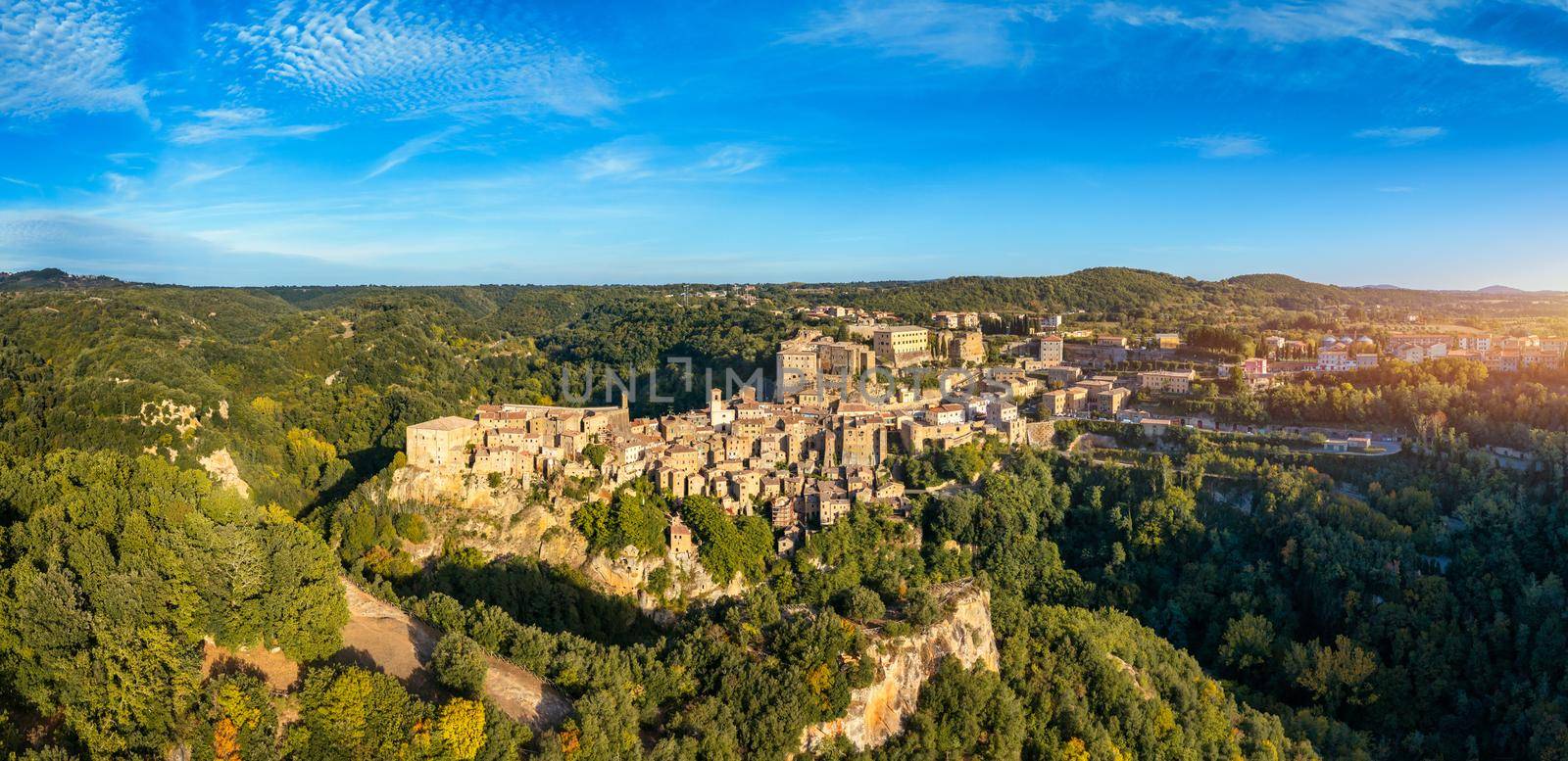 Sorano, a town built on a tuff rock, is one of the most beautiful city in Italy. Sorano as an ancient medieval hill town hanging from a tuff stone over the Lente River, Tuscany, Italy.