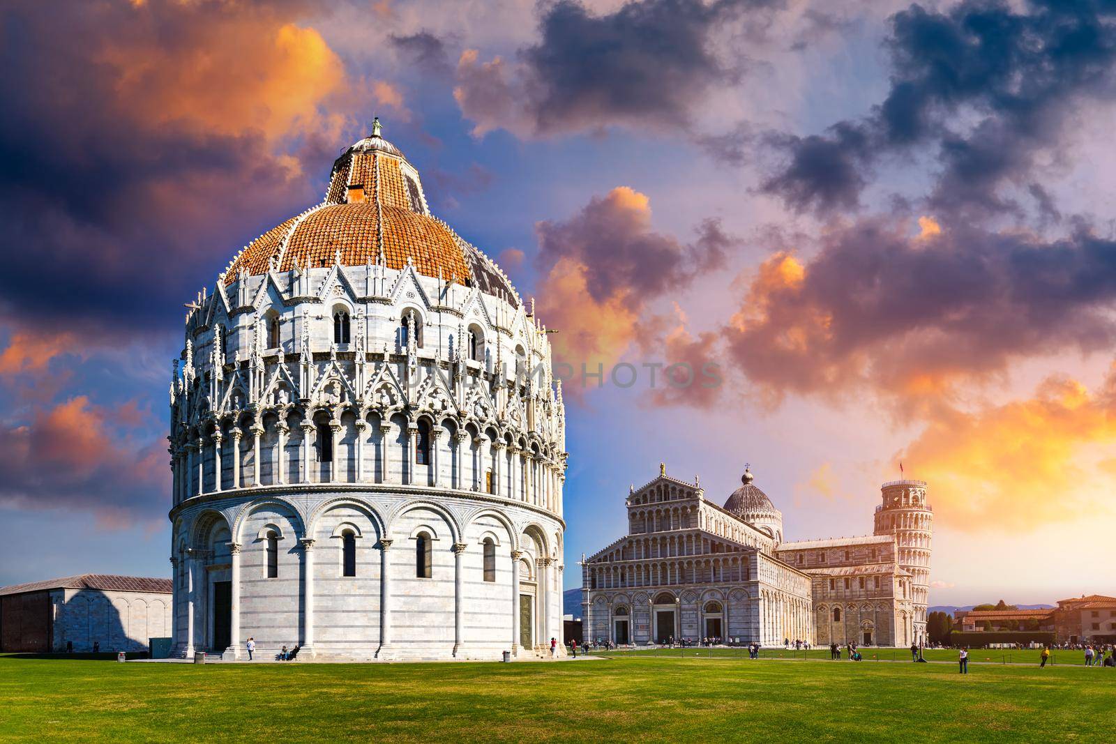 Pisa Cathedral and the Leaning Tower in a sunny day in Pisa, Italy. Pisa Cathedral with Leaning Tower of Pisa on Piazza dei Miracoli in Pisa, Tuscany, Italy.