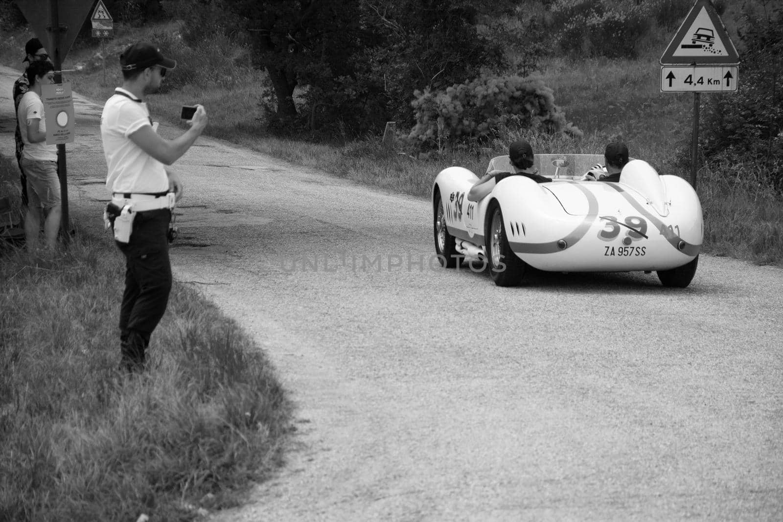 URBINO - ITALY - JUN 16 - 2022 : MASERATI 200 SI 1956 on an old racing car in rally Mille Miglia 2022 the famous italian historical race (1927-1957