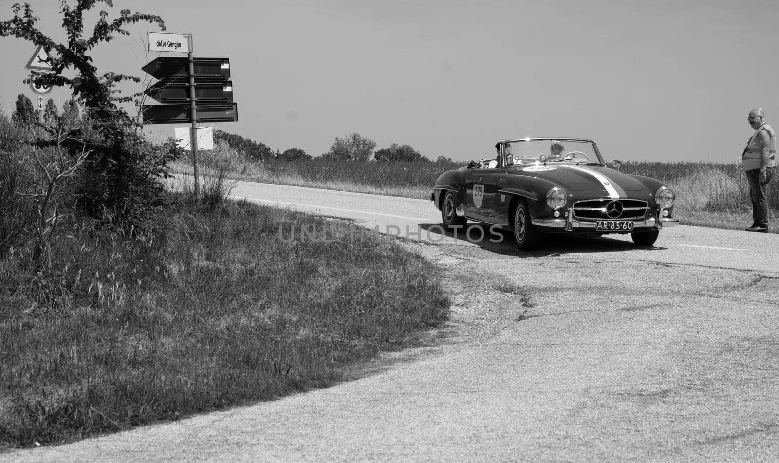 URBINO - ITALY - JUN 16 - 2022 : MERCEDES-BENZ 190 SL 1957 on an old racing car in rally Mille Miglia 2022 the famous italian historical race (1927-1957