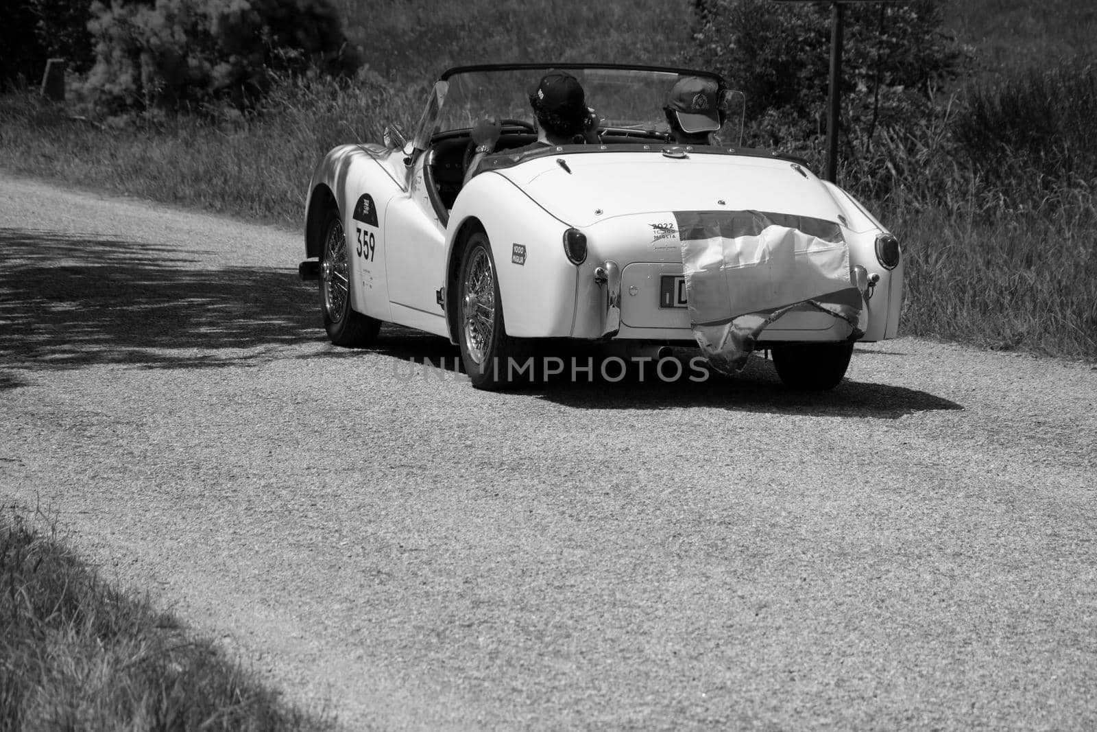 URBINO - ITALY - JUN 16 - 2022 : TRIUMPH TR3 SPORTS 1956 on an old racing car in rally Mille Miglia 2022 the famous italian historical race (1927-1957