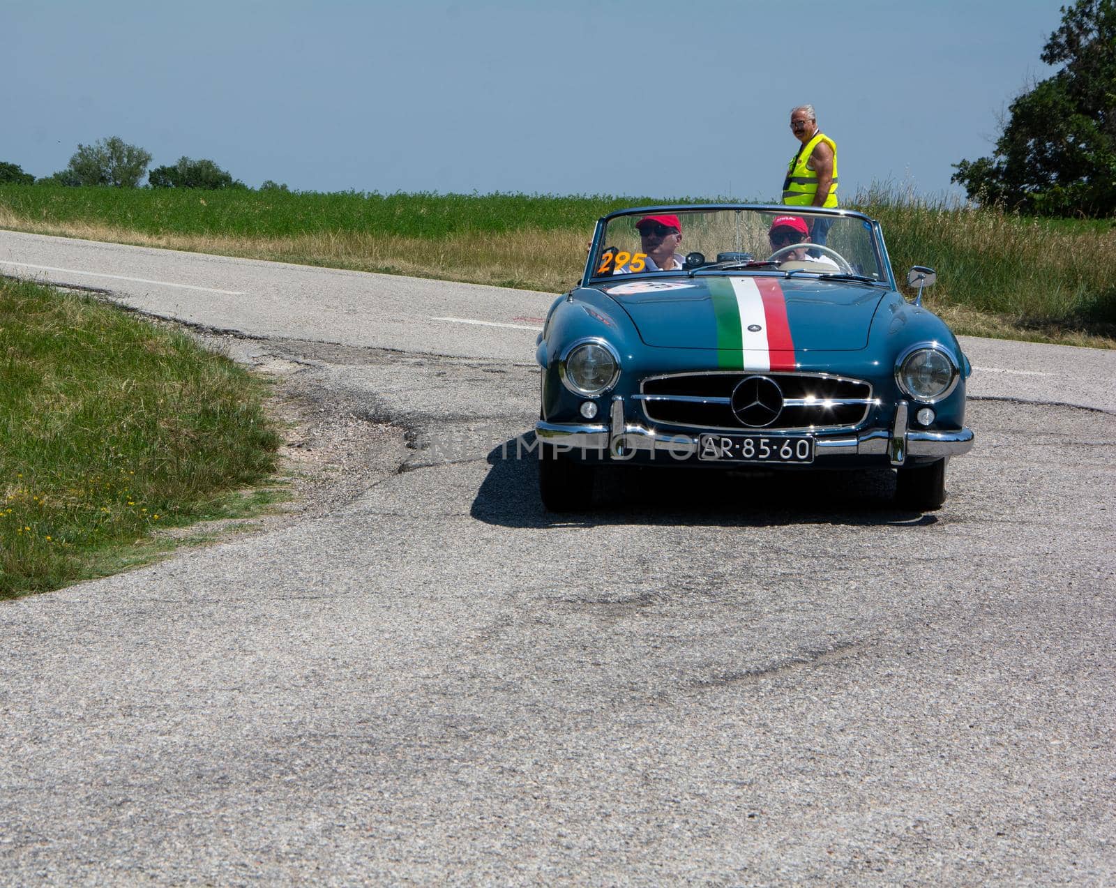 URBINO - ITALY - JUN 16 - 2022 : MERCEDES-BENZ 190 SL 1957 on an old racing car in rally Mille Miglia 2022 the famous italian historical race (1927-1957