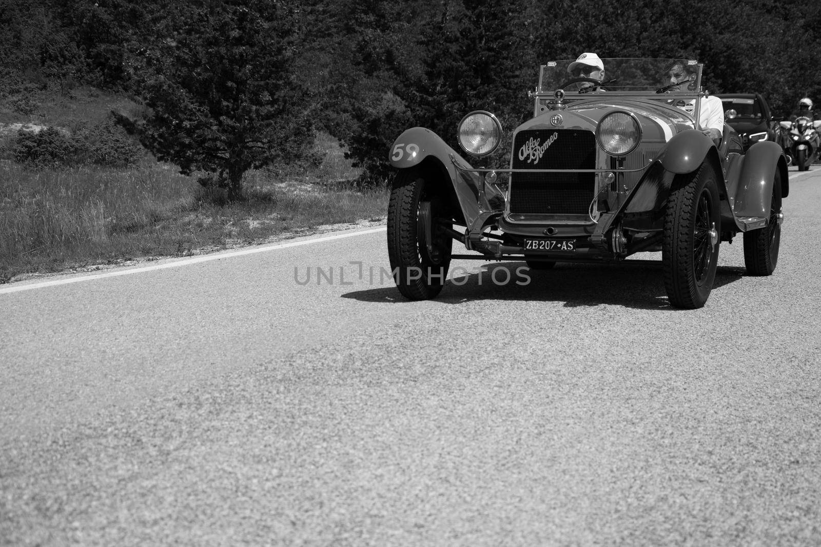 URBINO - ITALY - JUN 16 - 2022 : ALFA ROMEO 6C 1750 GRAN SPORT CARR. SPORT 1930 on an old racing car in rally Mille Miglia 2022 the famous italian historical race (1927-1957