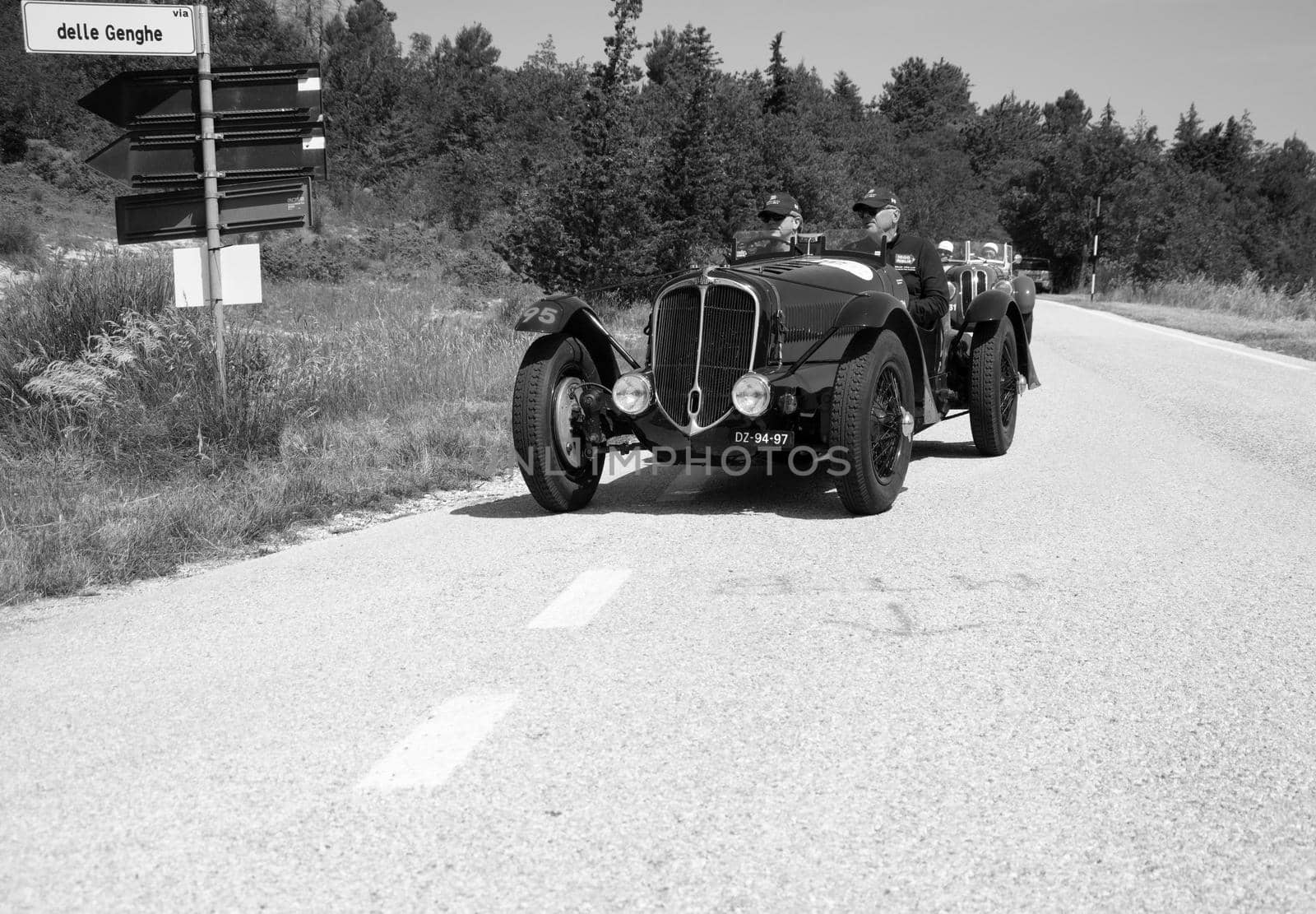 URBINO - ITALY - JUN 16 - 2022 : DELAHAYE 135 CS 1936 on an old racing car in rally Mille Miglia 2022 the famous italian historical race (1927-1957