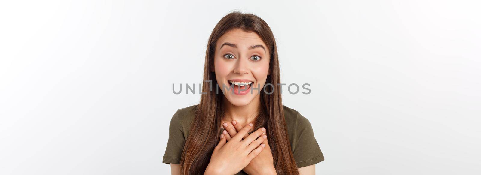 Portrait joyful outgoing woman likes laugh out loud not hiding emotions giggling chuckling facepalm close eyes smiling broadly white background.