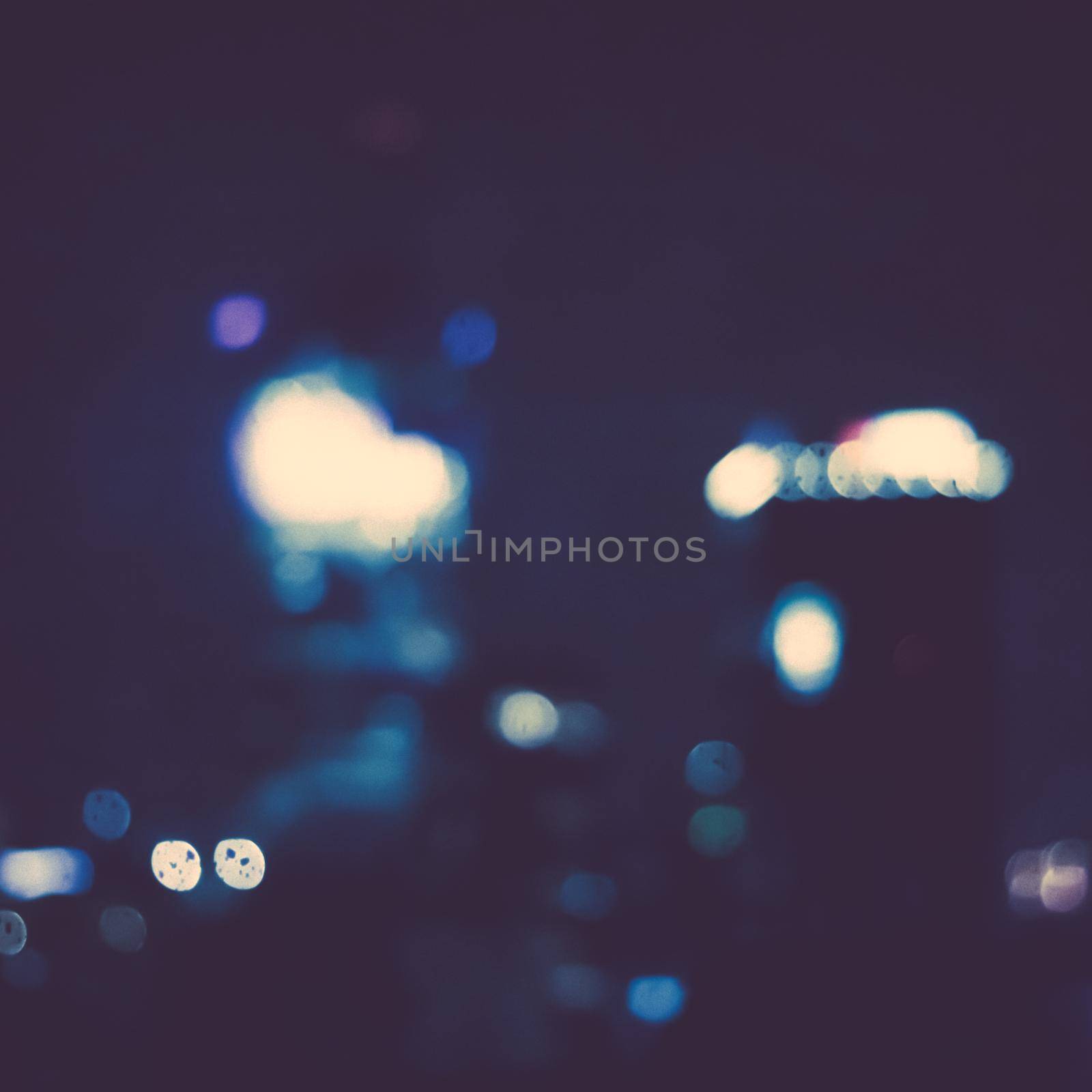 Big metropolitan city lights at night, blurry background by Anneleven