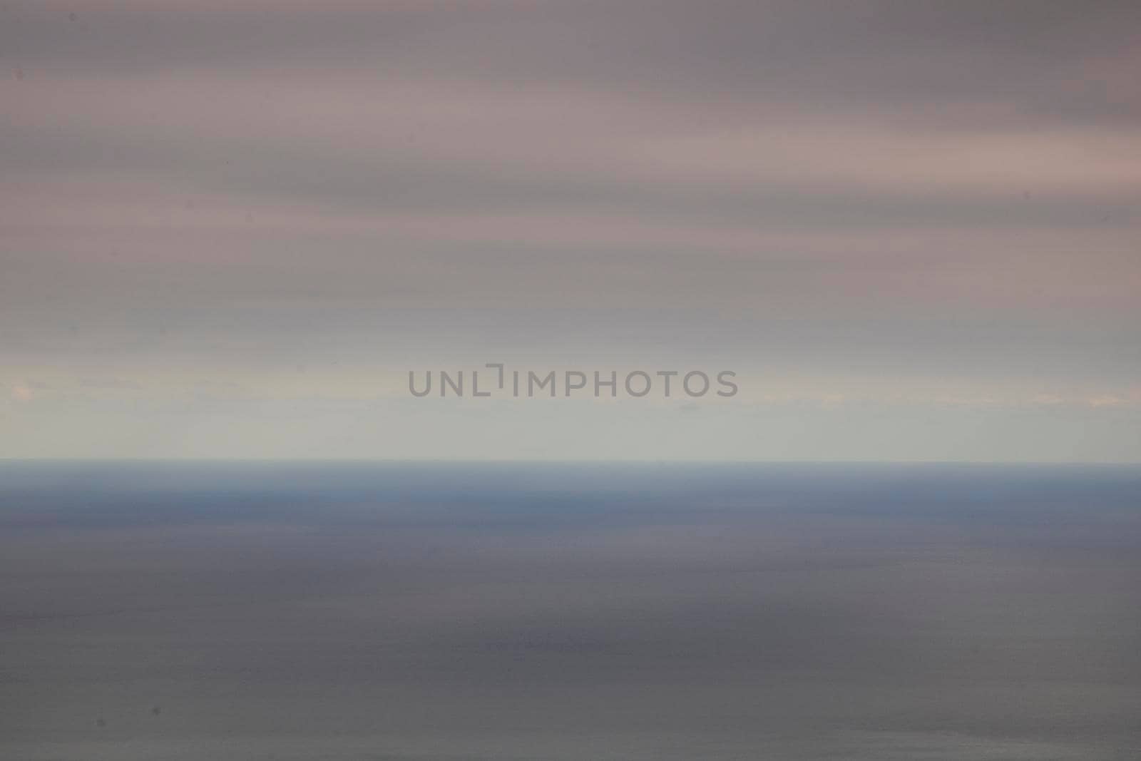 Minimalist textured seascape showing blue sea and sky