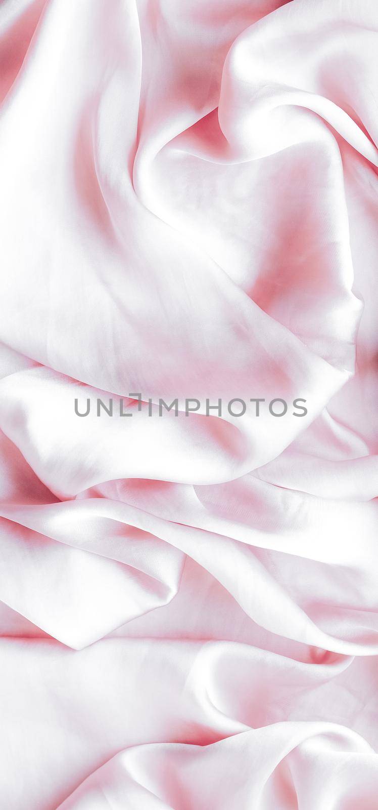 Elegant fabric texture, abstract backdrop and modern pastel colours concept - Pink soft silk waves, flatlay background