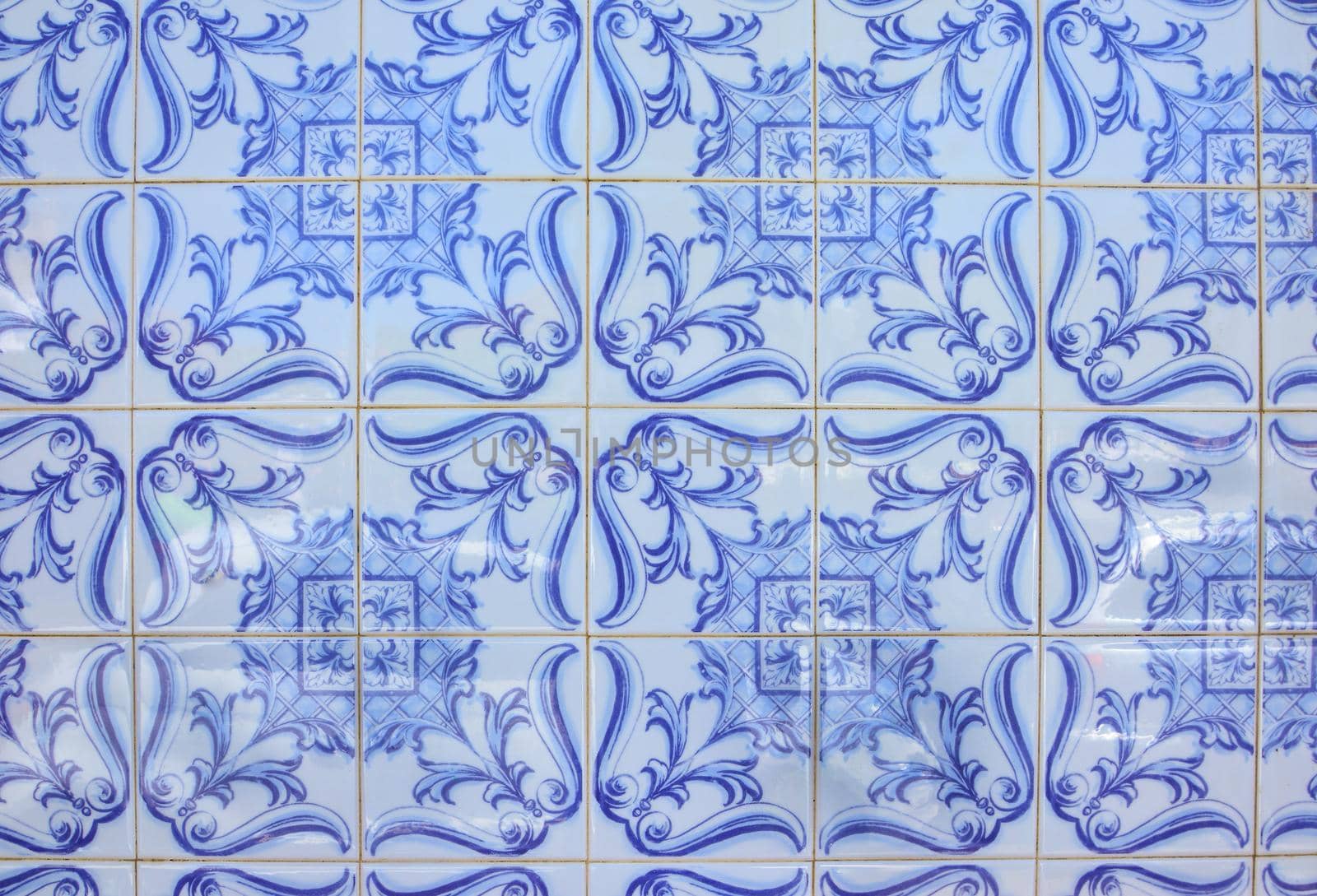 Typical old tiles of Portugal, detail of a classic ceramic tiles azulejo, art of Portugal