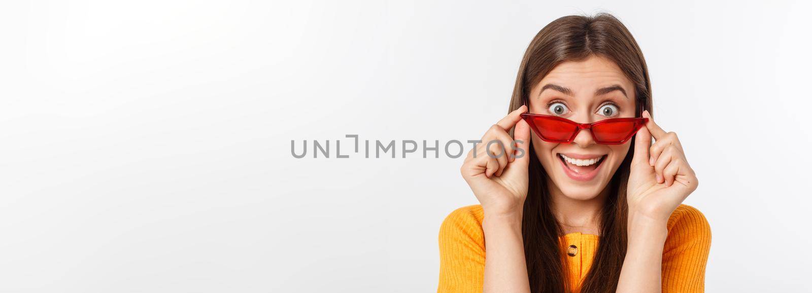 Fashion girl hipster in glasses. White background isolated
