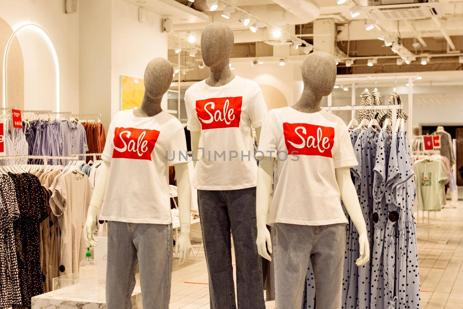 Faceless mannequins in casual clothes in fashion shop clothing store, black friday sale shopping concept, seasonal offer promo, selective focus
