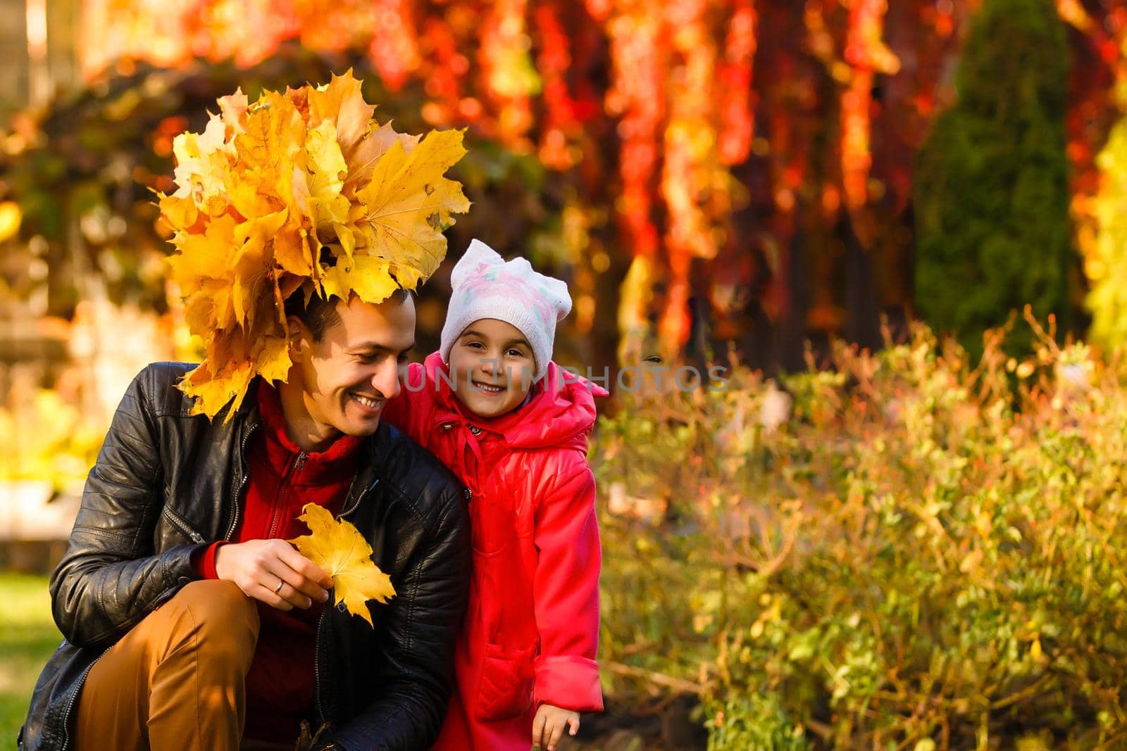 Colorful autumn leaves, happy family