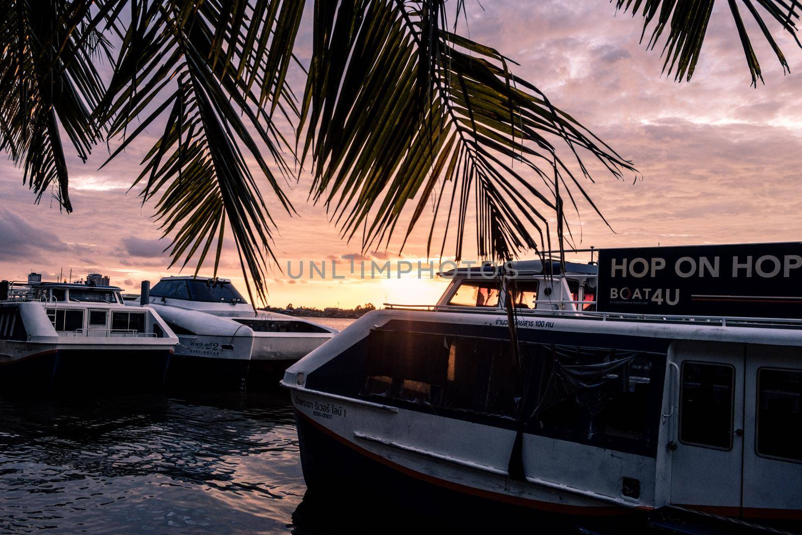Bangkok Thailand Bangkok Smart Ferry electric passenger boat service Urban Line at pier waiting for depart at sunset