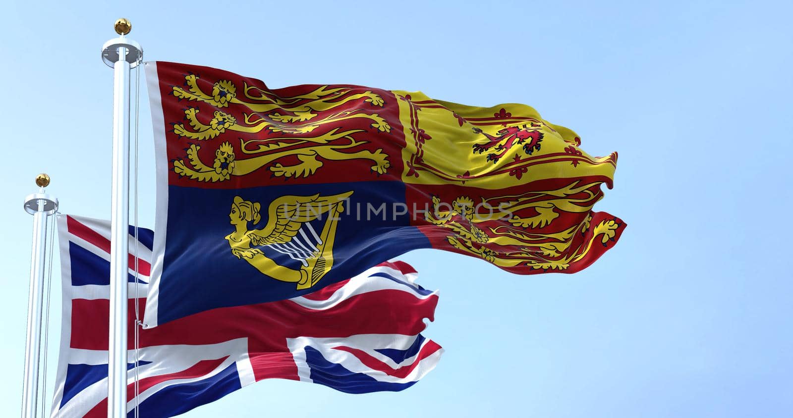 London, UK, September 2022: The Royal Standard of the United Kingdom waving the wind along with the UK flag