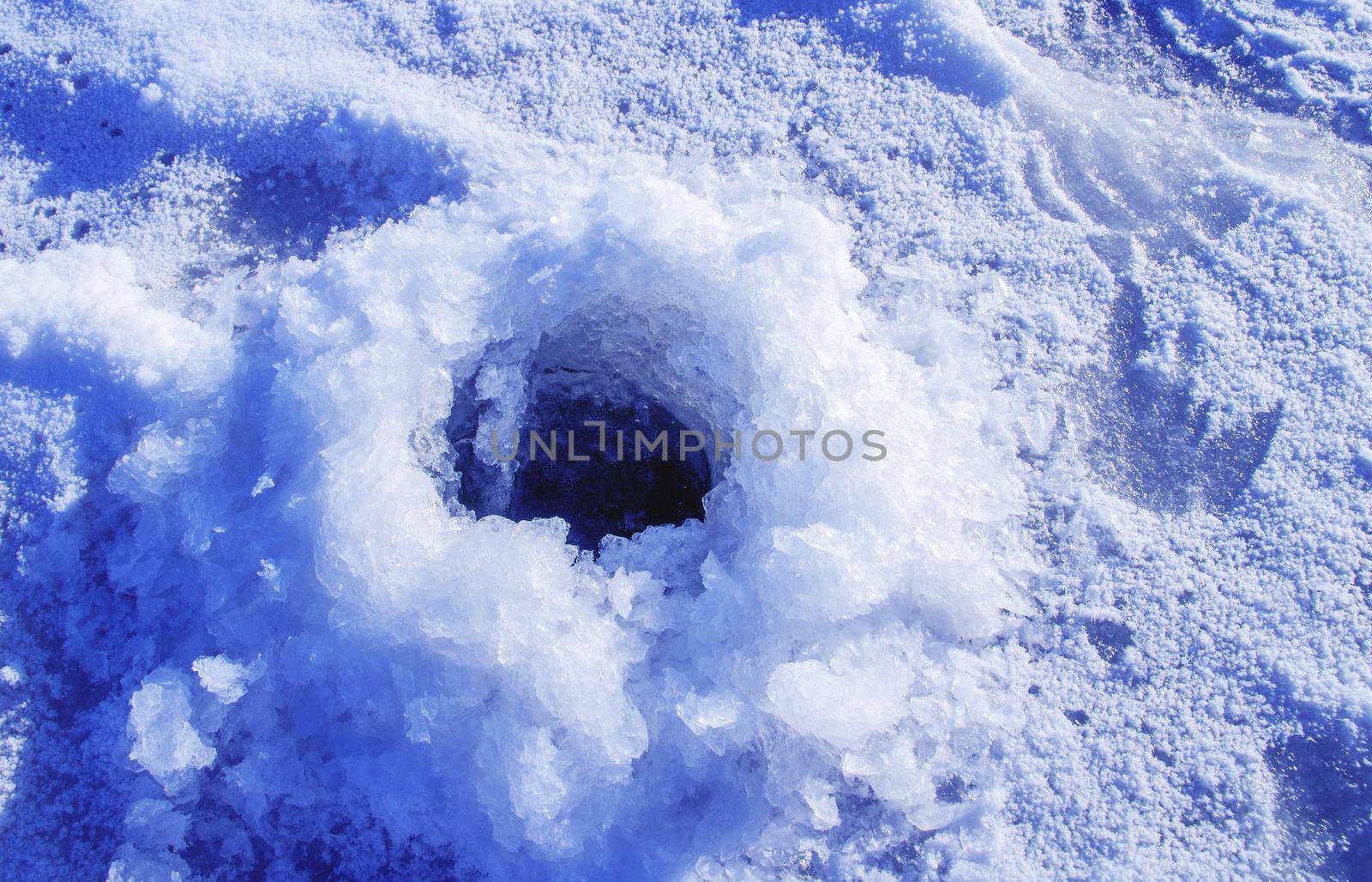 Snow covered ice hole. by gelog67