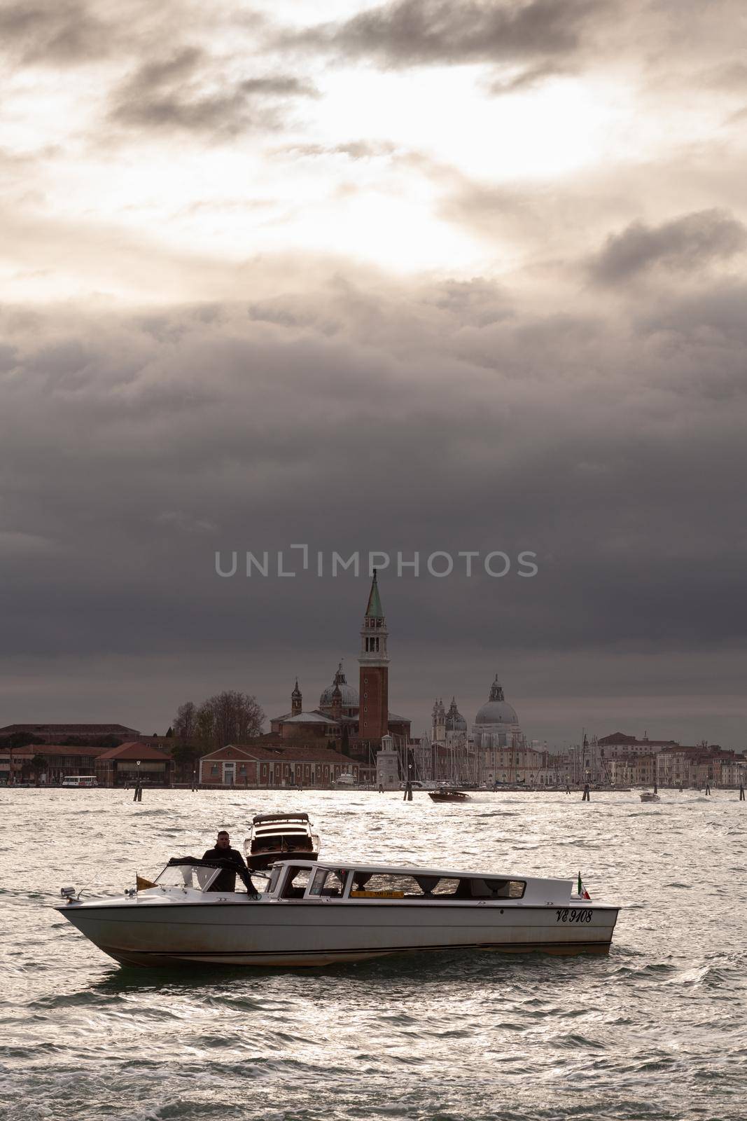 View of the St. Giorgio church on the cloudy sky by bepsimage