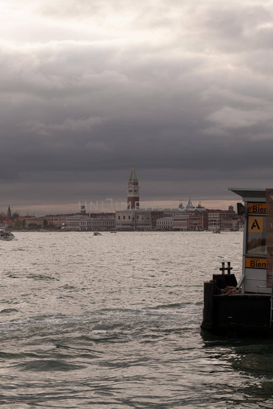View of the St Mark's Campanile on the cloudy sky by bepsimage