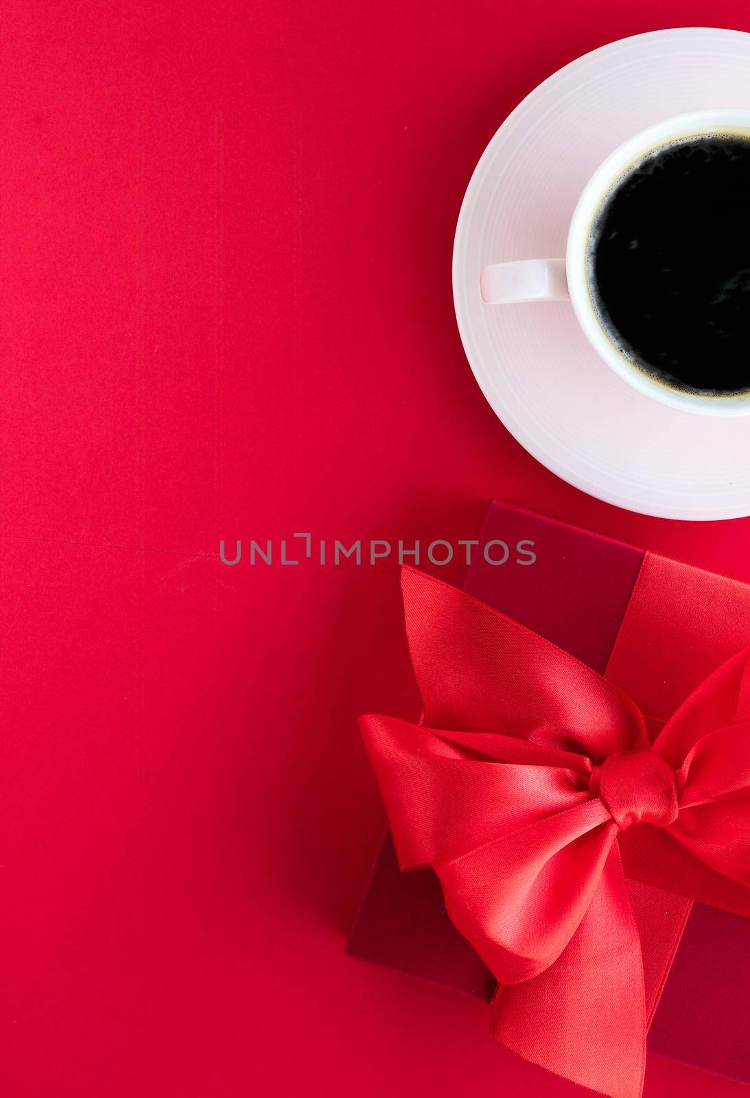 Romantic celebration, lifestyle and birthday present concept - Luxury beauty gift box and coffee on red, flatlay