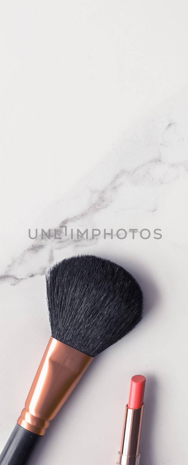 Make-up and cosmetics flatlay on marble by Anneleven